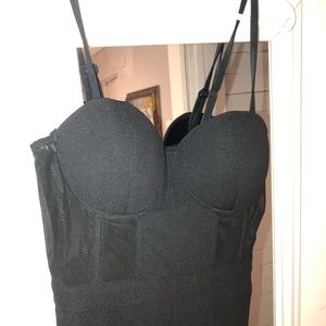 Black jumpsuit with adjustable straps, never worn